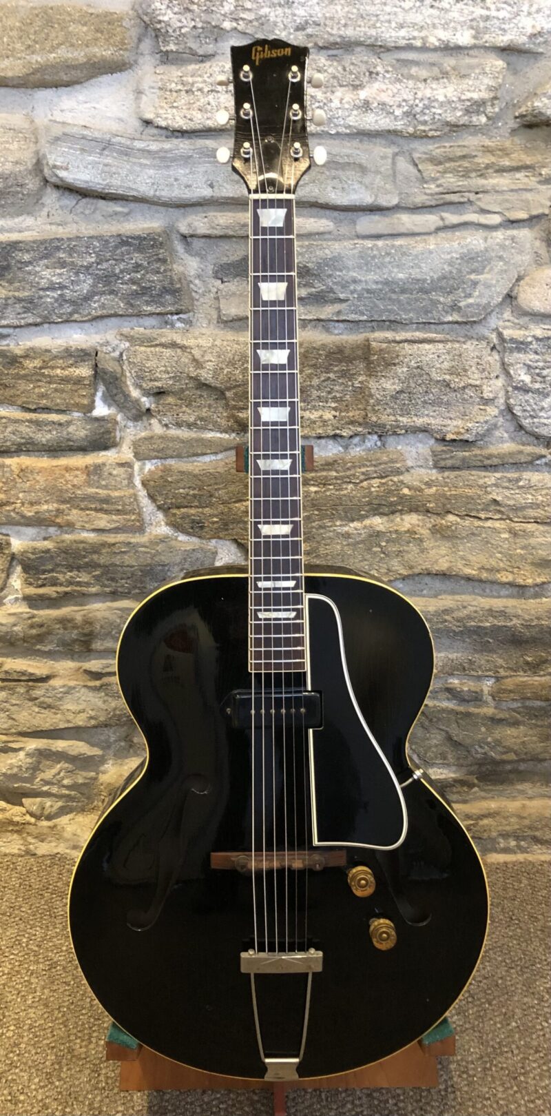 Vintage 1952 Gibson ES-150 archtop electric guitar with black finish and original hardware at AcousticMusic.Org