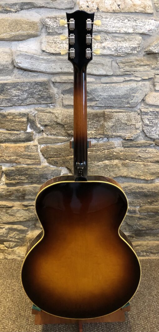 Back of the 1950 Gibson ES-300 highlighting the flame maple back and elegant binding along the body and neck.