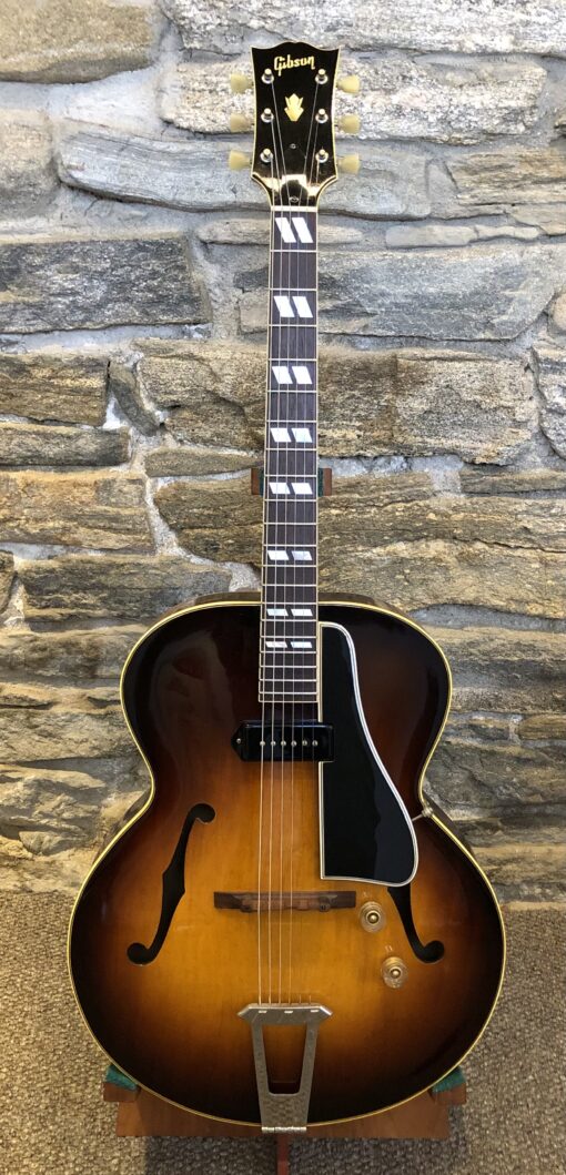 Front view of the 1950 Gibson ES-300 showcasing its sunburst finish, single P-90 pickup, and classic archtop design.
